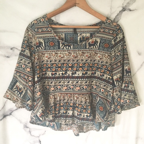 Runway Story Tops - Elephant Print Peplum Blouse Runway Story Tops - Elephant Print Peplum Blouse